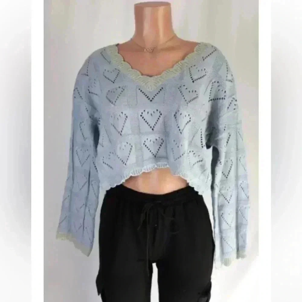 On You women’s Heart Knit Crop Sweater Top
Long sleeve blue sz Small preloved